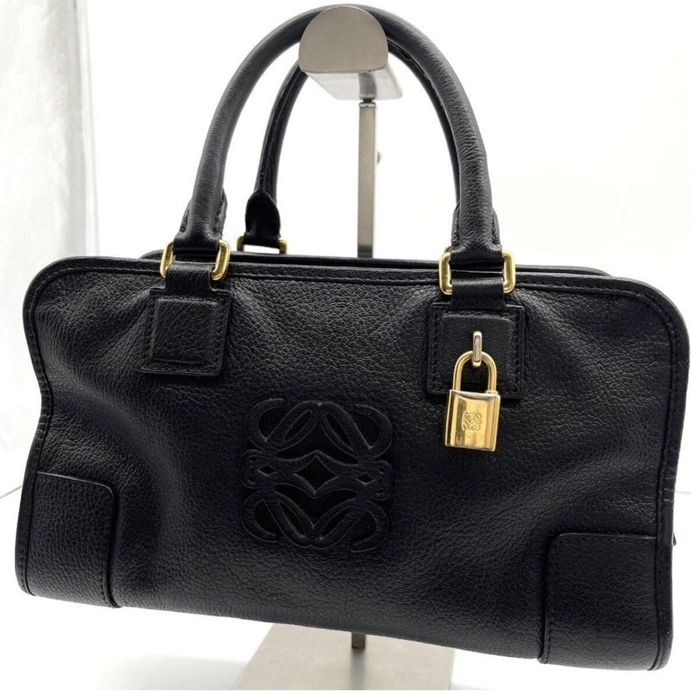 Loewe black leather purse reminds Hermes Kelly cut palladium